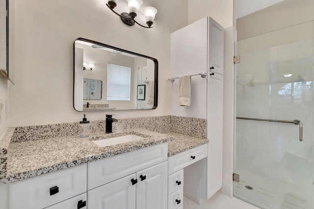 12589 Via Ravenna, Boynton Beach, FL 33436 - bathroom featuring a stall shower, vanity, and an inviting chandelier