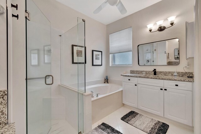12589 Via Ravenna, Boynton Beach, FL 33436 - full bathroom featuring tile patterned floors, a garden tub, a stall shower, a ceiling fan, and vanity