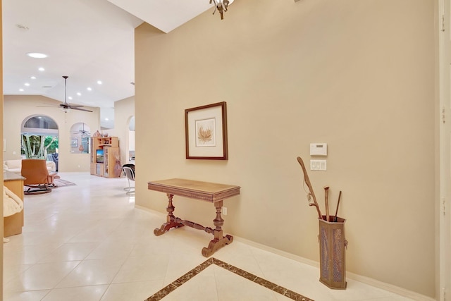 12589 Via Ravenna, Boynton Beach, FL 33436 - corridor with light tile patterned floors, recessed lighting, baseboards, and lofted ceiling