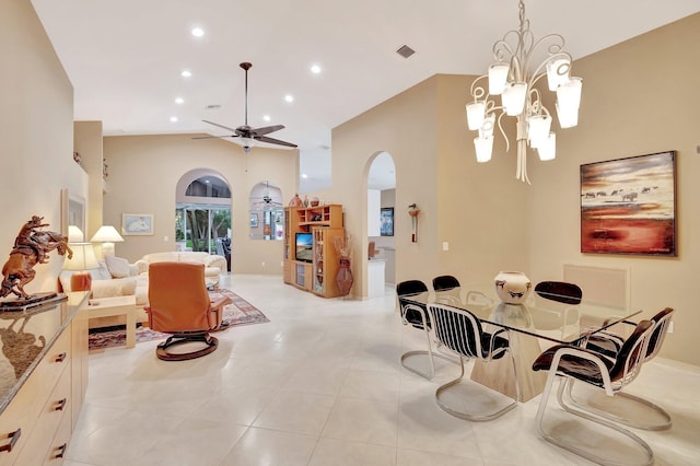 12589 Via Ravenna, Boynton Beach, FL 33436 - dining room featuring light tile patterned floors, high vaulted ceiling, recessed lighting, arched walkways, and ceiling fan with notable chandelier
