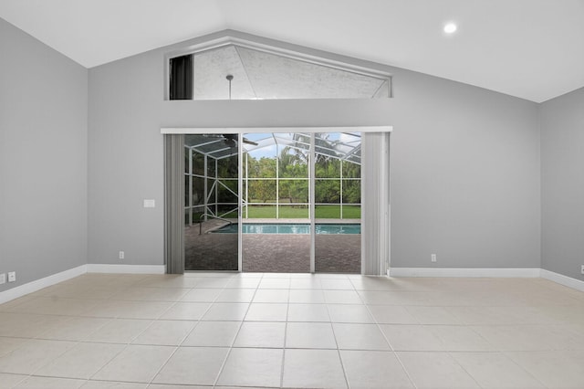 9025 Long Lake Palm Dr, Boca Raton, FL 33496 - tiled spare room with a sunroom, baseboards, high vaulted ceiling, and recessed lighting