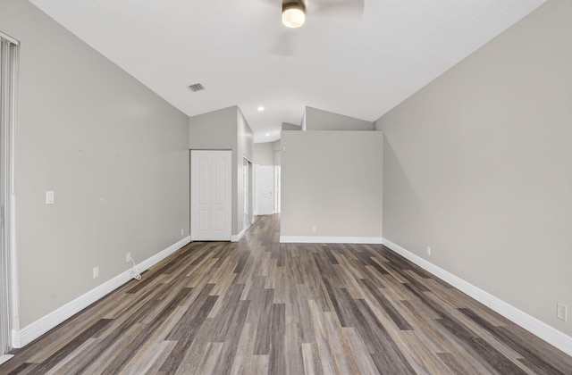 9025 Long Lake Palm Dr, Boca Raton, FL 33496 - spare room with ceiling fan, lofted ceiling, wood finished floors, baseboards, and recessed lighting