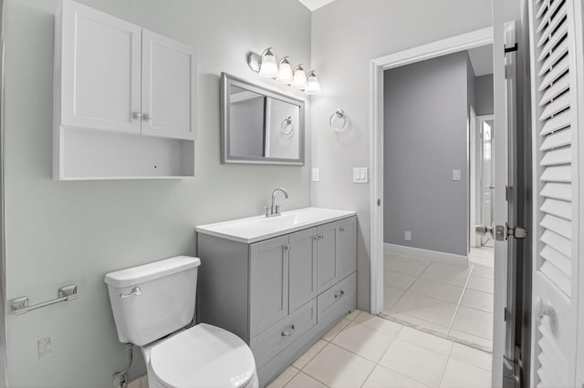 9025 Long Lake Palm Dr, Boca Raton, FL 33496 - bathroom with vanity, toilet, and tile patterned floors