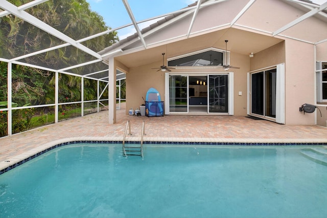 9025 Long Lake Palm Dr, Boca Raton, FL 33496 - swimming pool with a patio area, ceiling fan, and glass enclosure