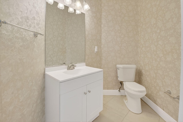 9025 Long Lake Palm Dr, Boca Raton, FL 33496 - half bath with toilet, wallpapered walls, tile patterned flooring, vanity, and baseboards