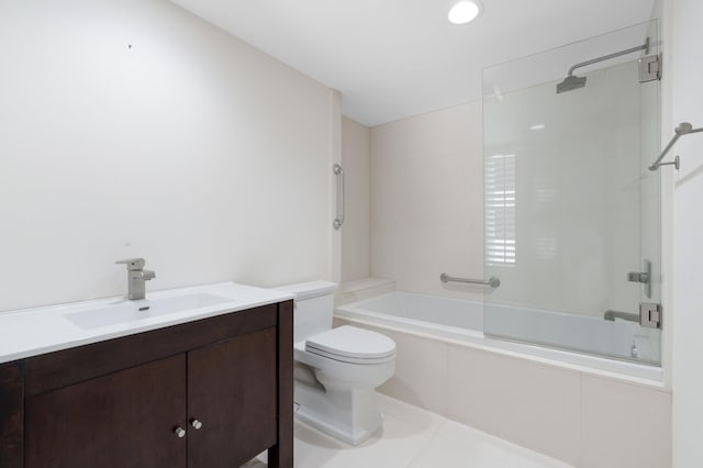 529 S Flagler Dr Unit 6E, West Palm Beach, FL 33401 - bathroom featuring toilet, enclosed tub / shower combo, vanity, and tile patterned floors