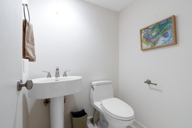 529 S Flagler Dr Unit 6E, West Palm Beach, FL 33401 - half bathroom with toilet and baseboards