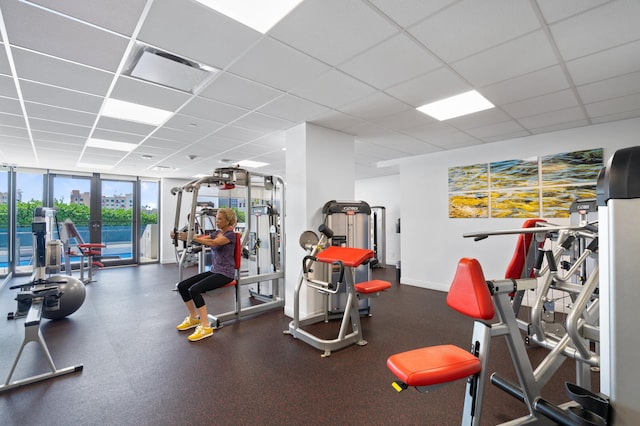 529 S Flagler Dr Unit 6E, West Palm Beach, FL 33401 - gym featuring a drop ceiling and expansive windows