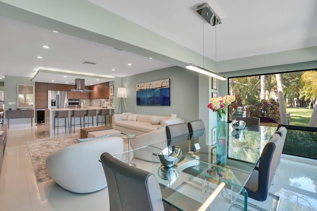 dining area with recessed lighting, visible vents, and wine cooler