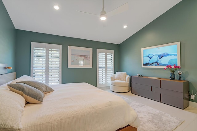 bedroom featuring recessed lighting, multiple windows, ceiling fan, and vaulted ceiling