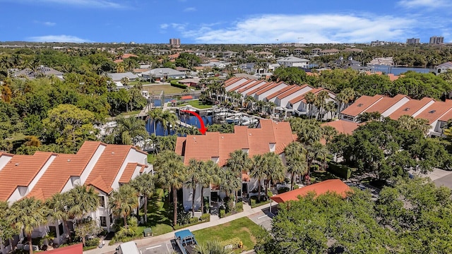 bird's eye view with a water view and a residential view