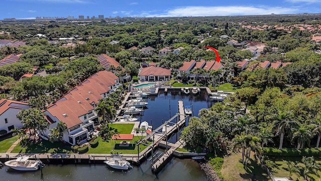 birds eye view of property with a residential view and a water view