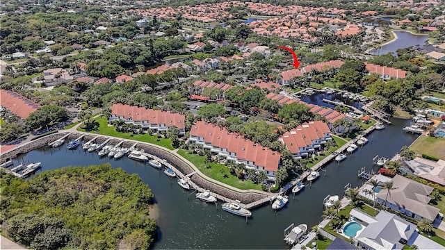 aerial view featuring a residential view and a water view