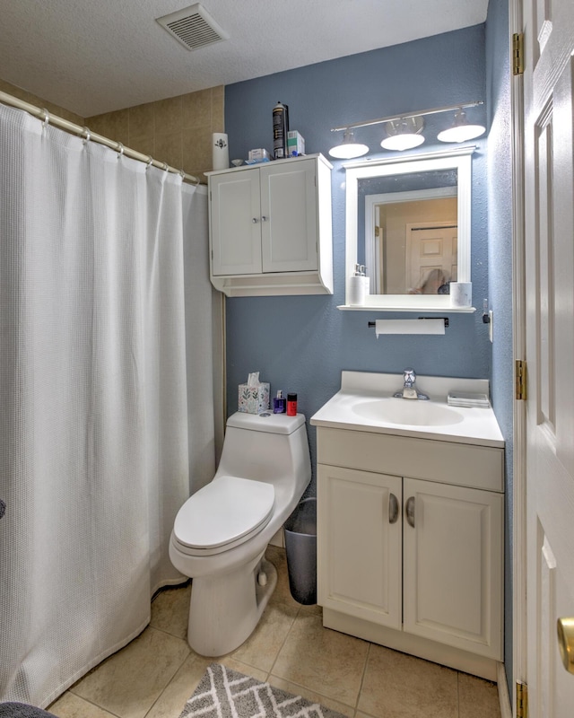 full bath with vanity, visible vents, curtained shower, tile patterned floors, and toilet