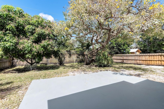 991 SW 31st St, Fort Lauderdale, FL 33315 - view of yard with a patio area and a fenced backyard
