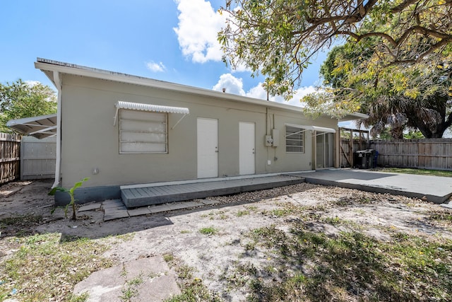 991 SW 31st St, Fort Lauderdale, FL 33315 - back of house with a patio area, stucco siding, and fence