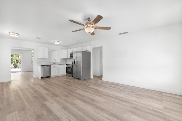 991 SW 31st St, Fort Lauderdale, FL 33315 - kitchen with a ceiling fan, visible vents, appliances with stainless steel finishes, and a sink