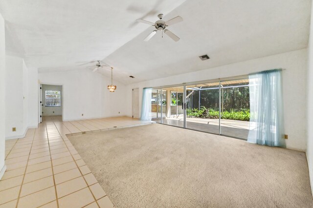 5116 Palm Way, Lake Worth, FL 33463 - carpeted empty room with tile patterned flooring, lofted ceiling, a ceiling fan, and baseboards