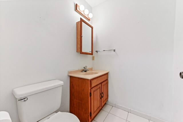 5116 Palm Way, Lake Worth, FL 33463 - bathroom with toilet, tile patterned floors, and vanity