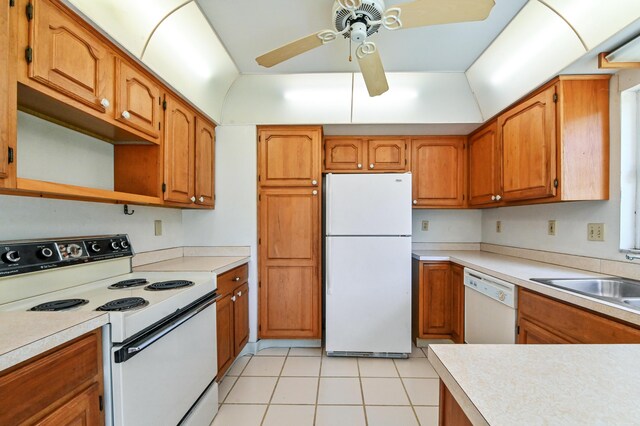 5116 Palm Way, Lake Worth, FL 33463 - kitchen featuring white appliances, a sink, ceiling fan, and brown cabinets