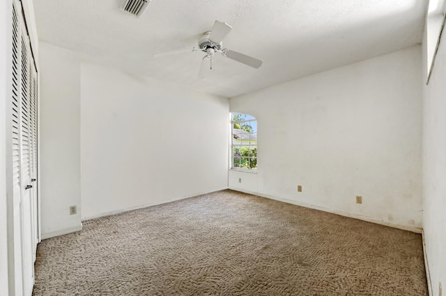 5116 Palm Way, Lake Worth, FL 33463 - unfurnished bedroom with carpet, baseboards, and ceiling fan