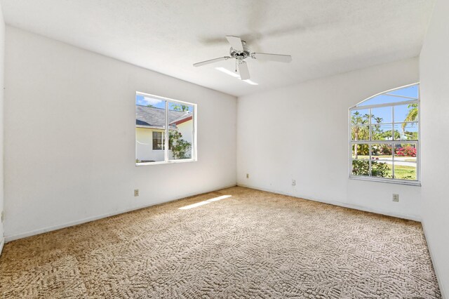 5116 Palm Way, Lake Worth, FL 33463 - carpeted spare room featuring a ceiling fan