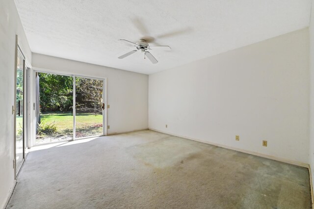 5116 Palm Way, Lake Worth, FL 33463 - empty room with carpet flooring and a ceiling fan