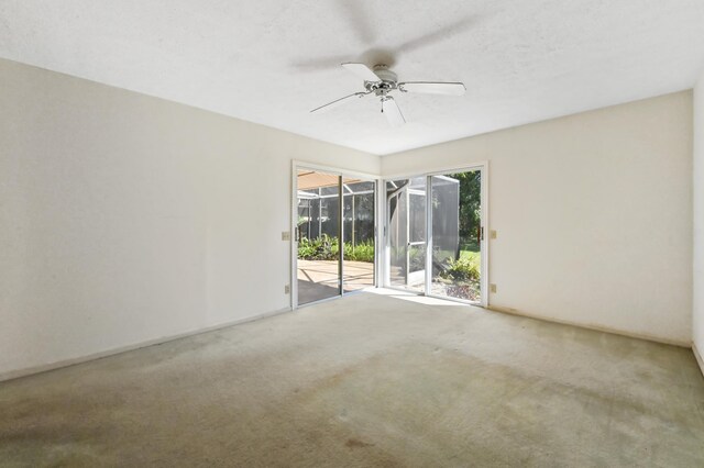5116 Palm Way, Lake Worth, FL 33463 - spare room with a ceiling fan and carpet floors