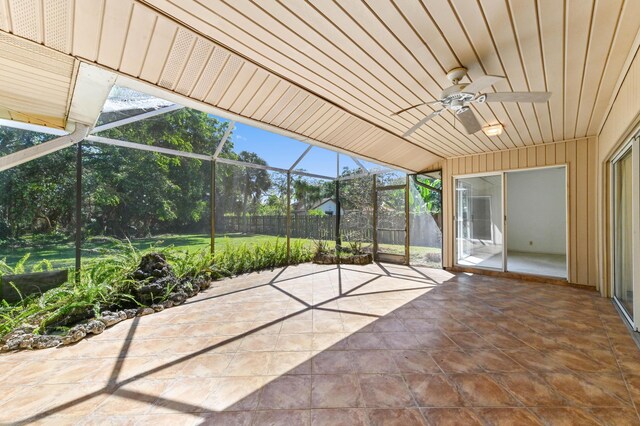 5116 Palm Way, Lake Worth, FL 33463 - unfurnished sunroom with ceiling fan