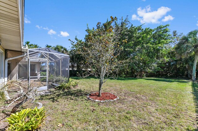 5116 Palm Way, Lake Worth, FL 33463 - view of grassy yard featuring a lanai