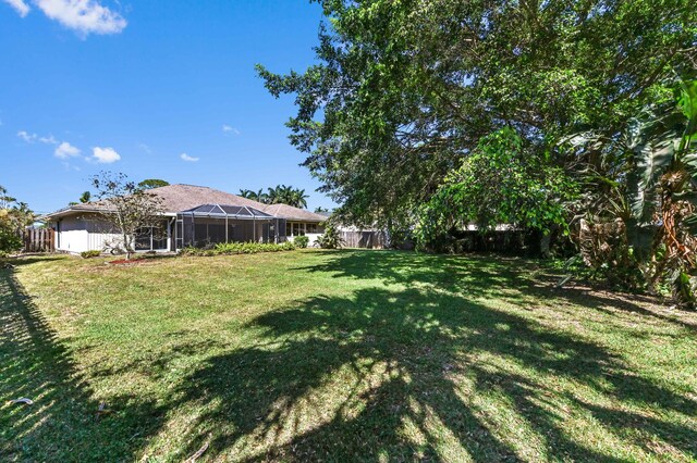 5116 Palm Way, Lake Worth, FL 33463 - view of yard featuring a lanai