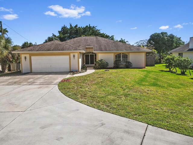 5116 Palm Way, Lake Worth, FL 33463 - single story home featuring stucco siding, concrete driveway, and an attached garage