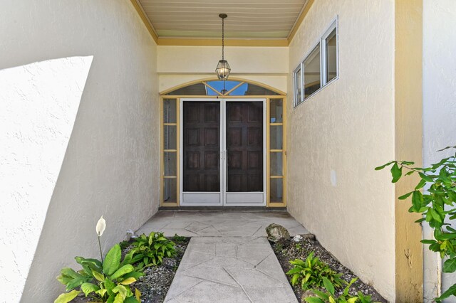 5116 Palm Way, Lake Worth, FL 33463 - view of exterior entry featuring stucco siding