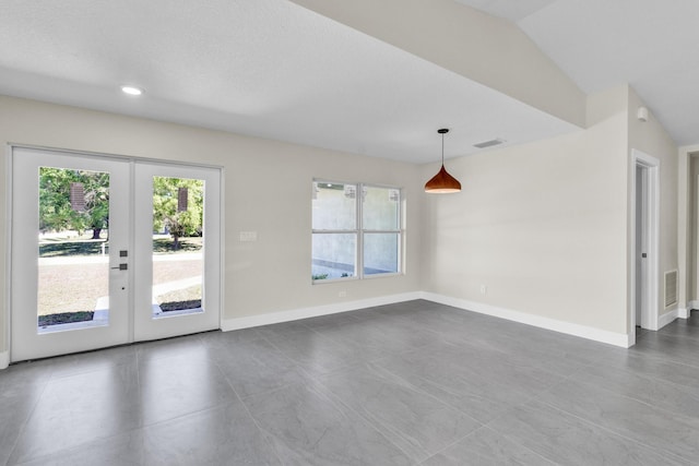 8585 100th Ave, Vero Beach, FL 32967 - unfurnished room featuring french doors, recessed lighting, and baseboards