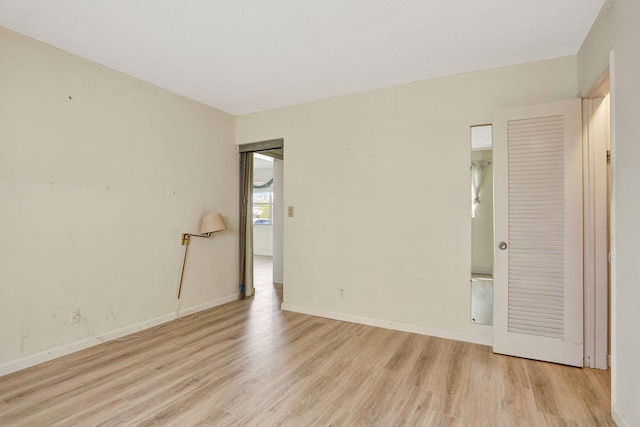 3212 NE 8th Ct Unit 7, Pompano Beach, FL 33062 - spare room with wood finished floors and baseboards