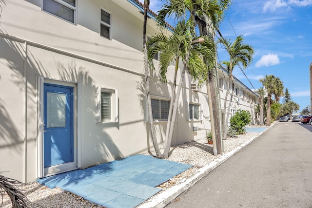 3212 NE 8th Ct Unit 7, Pompano Beach, FL 33062 - view of side of property featuring stucco siding