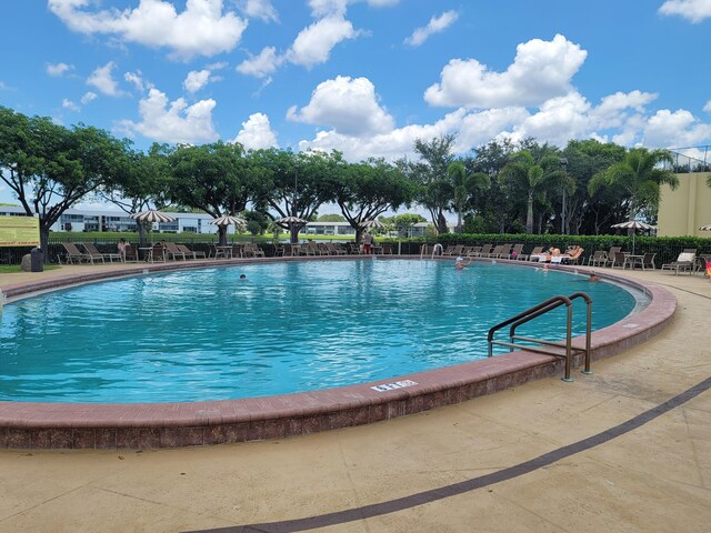 263 Windsor L, West Palm Beach, FL 33417 - community pool featuring a patio
