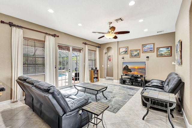 3434 Vanderbilt Dr, Wellington, FL 33414 - living room featuring recessed lighting, light tile patterned floors, visible vents, and arched walkways