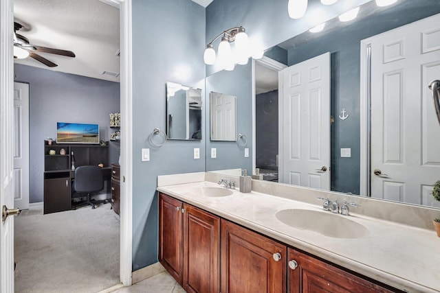 3434 Vanderbilt Dr, Wellington, FL 33414 - full bath featuring double vanity, visible vents, ceiling fan, and a sink