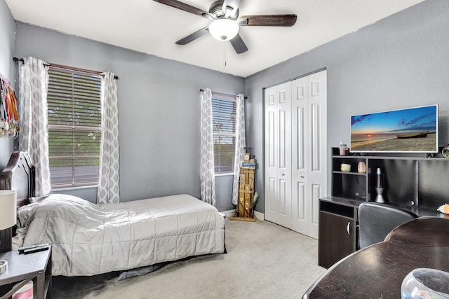 3434 Vanderbilt Dr, Wellington, FL 33414 - bedroom with multiple windows, carpet flooring, a ceiling fan, and a closet