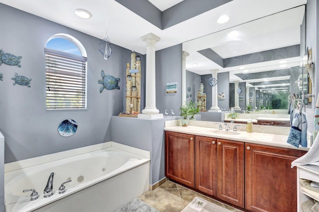 3434 Vanderbilt Dr, Wellington, FL 33414 - full bathroom featuring vanity, decorative columns, recessed lighting, a whirlpool tub, and tile patterned flooring