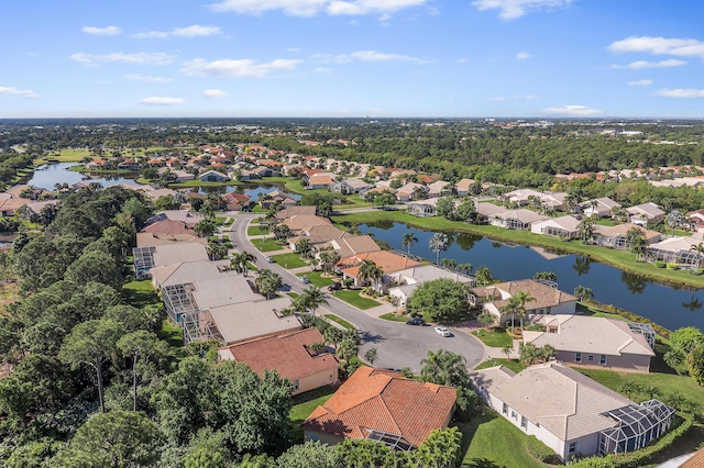 aerial view featuring a residential view and a water view