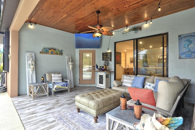 5561 1st Sq SW, Vero Beach, FL 32968 - living area featuring wood finished floors, wood ceiling, and ceiling fan