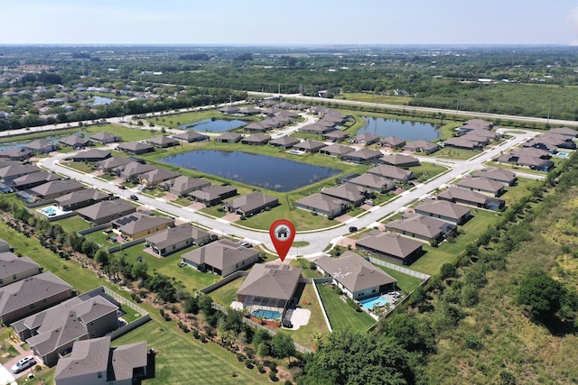 5561 1st Sq SW, Vero Beach, FL 32968 - aerial view featuring a water view and a residential view