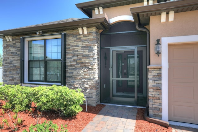 5561 1st Sq SW, Vero Beach, FL 32968 - property entrance with stone siding and stucco siding