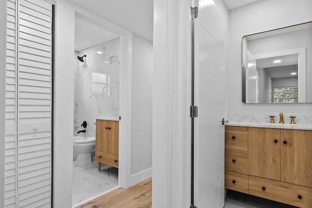 314 Monaco Unit G, Delray Beach, FL 33446 - full bath featuring toilet, vanity, a marble finish shower, and baseboards