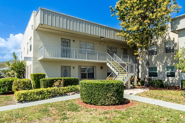 314 Monaco Unit G, Delray Beach, FL 33446 - view of building exterior featuring stairs