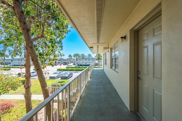 314 Monaco Unit G, Delray Beach, FL 33446 - balcony with a residential view and covered porch