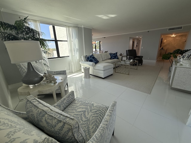 2003 N Ocean Blvd Unit 305N, Boca Raton, FL 33431 - tiled living room featuring baseboards, visible vents, and ornamental molding