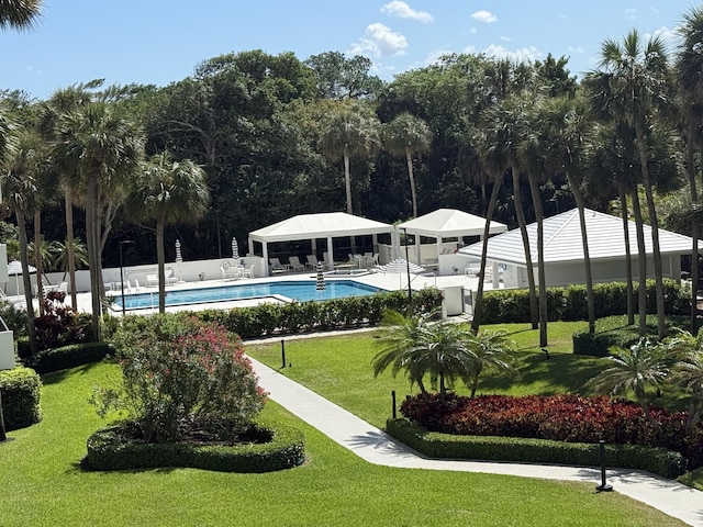 2003 N Ocean Blvd Unit 305N, Boca Raton, FL 33431 - view of property's community featuring fence, a gazebo, a swimming pool, a yard, and a patio area